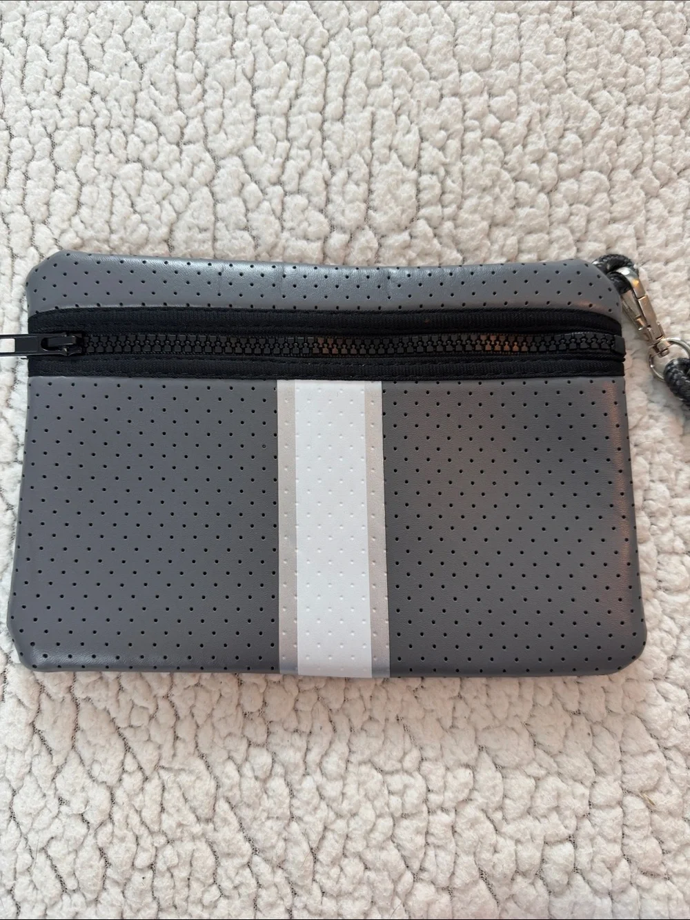 Perforated Gray Wristlet with Stripe Accent
